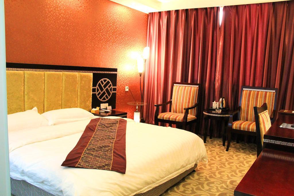 Jiuxiang Hotel Ťiou-čaj-kou Pokoj fotografie