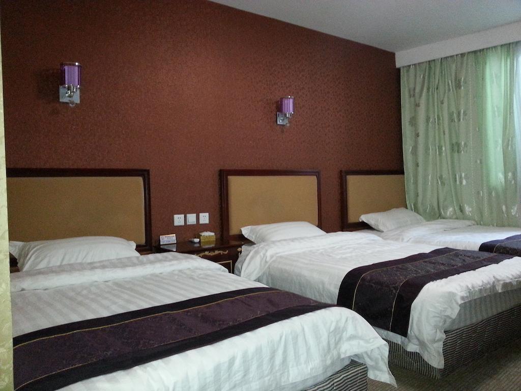Jiuxiang Hotel Ťiou-čaj-kou Pokoj fotografie