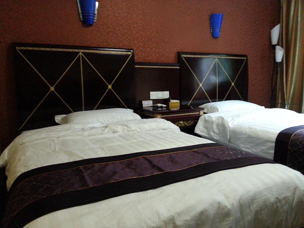 Jiuxiang Hotel Ťiou-čaj-kou Pokoj fotografie