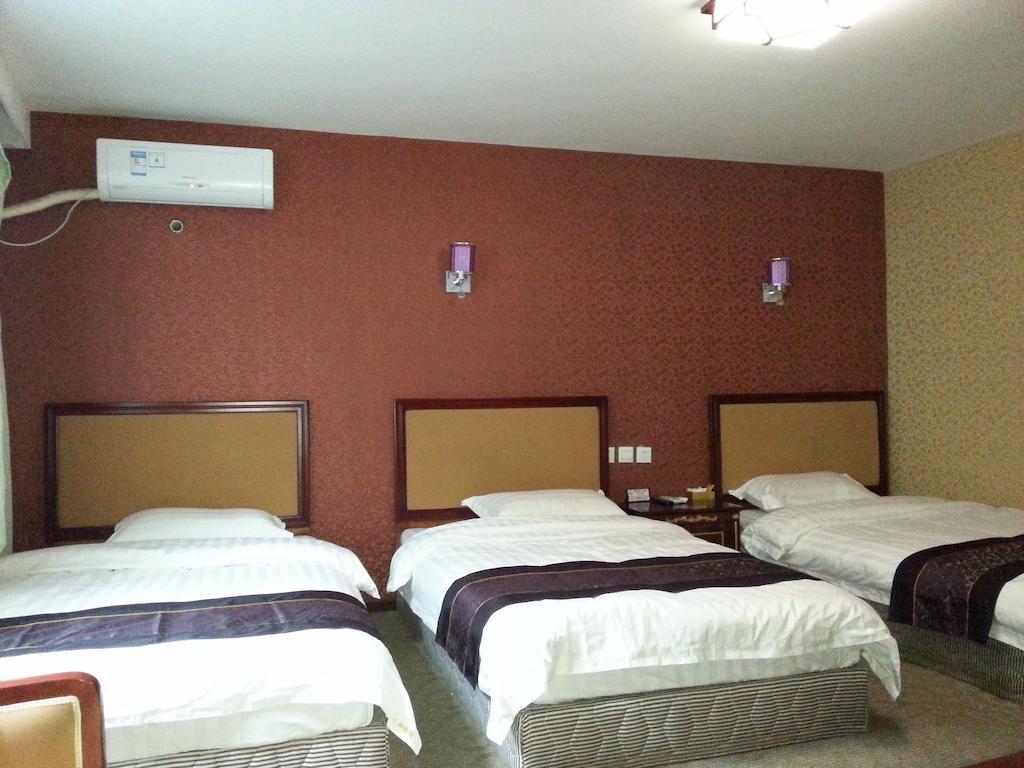 Jiuxiang Hotel Ťiou-čaj-kou Pokoj fotografie