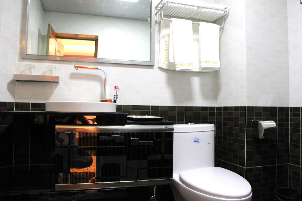 Jiuxiang Hotel Ťiou-čaj-kou Pokoj fotografie