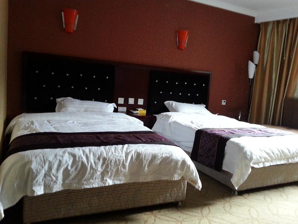 Jiuxiang Hotel Ťiou-čaj-kou Pokoj fotografie