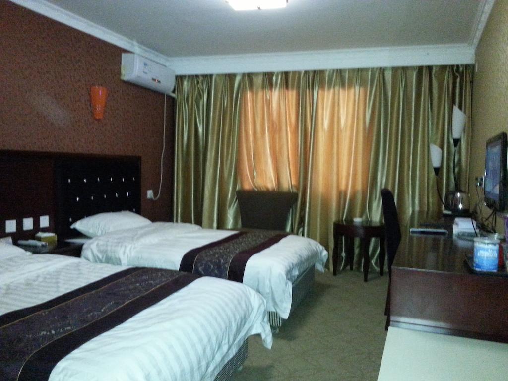 Jiuxiang Hotel Ťiou-čaj-kou Pokoj fotografie